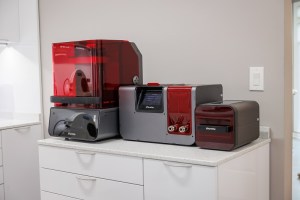 3D printing station showing Sprintray machine utilized for nightguards, retainers, and surgical guides often same day for extremely precise fitting appliances